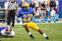 Pittsburgh running back Vincent Davis (22) plays against Massachusetts during the second half o ...