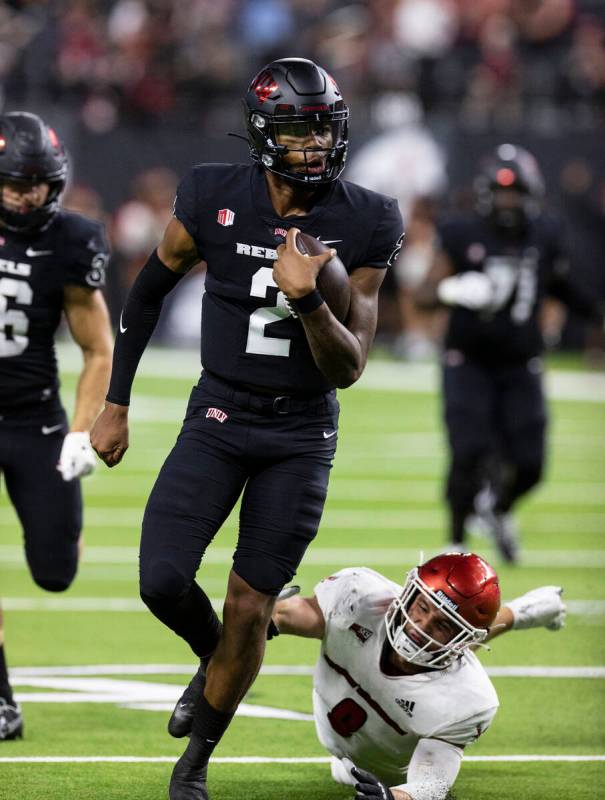 UNLV Rebels quarterback Doug Brumfield (2) goes for a touchdown during the fourth quarter of an ...