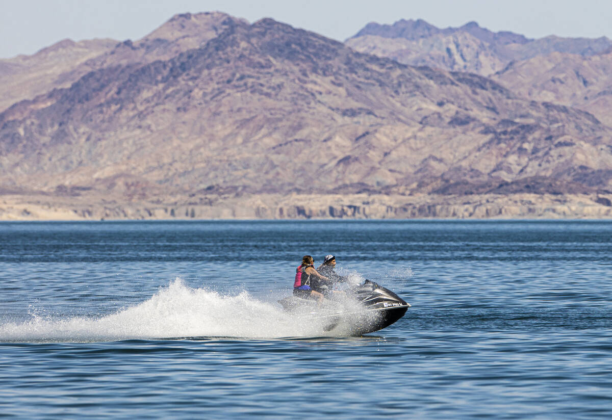 People jet ski at Lake Mead on Labor Day on Monday, Sept. 6, 2021, in Boulder City. (Benjamin H ...