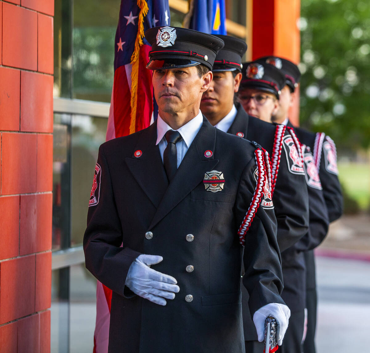 The Las Vegas Fire Department honor guard stand in formation Saturday, Sept. 11, 2021, at Fire ...