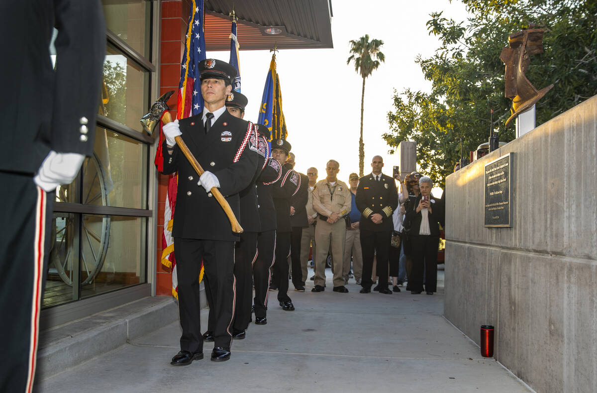 The Las Vegas Fire Department honor guard march in, Saturday, Sept. 11, 2021, at Fire Station F ...