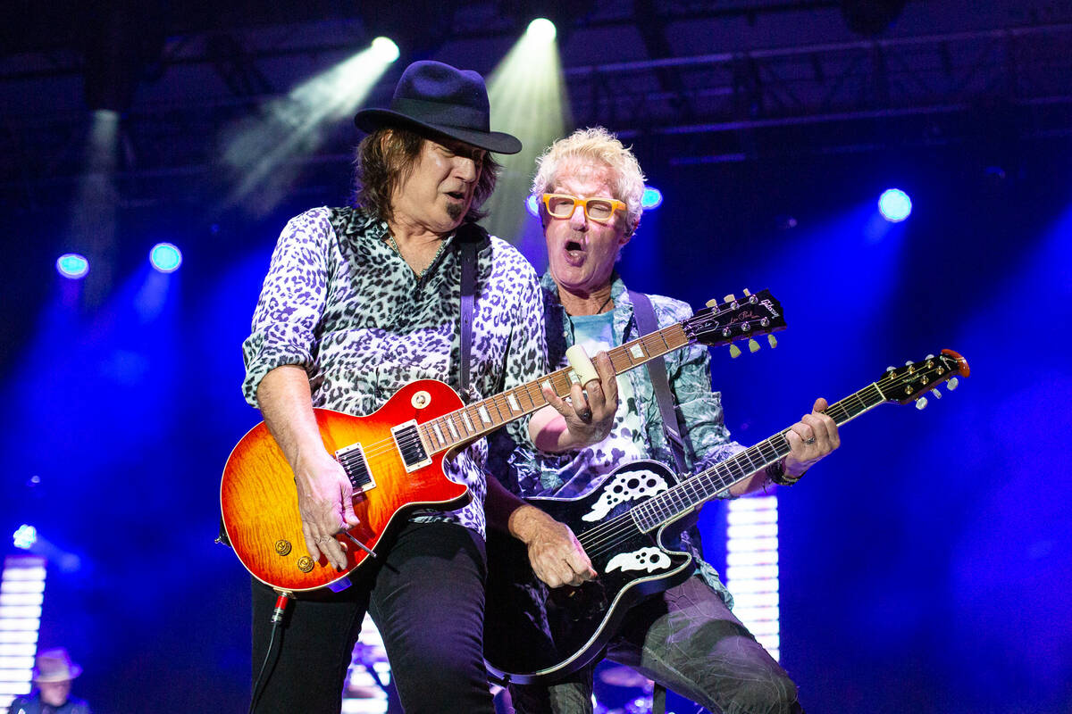 Gary Orton, left, and Kevin Cronin of REO Speedwagon perform at Sandbar Poolside at Red Rock Re ...