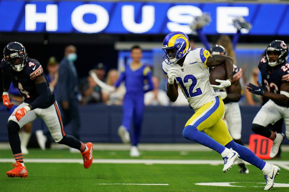 Los Angeles Rams wide receiver Van Jefferson runs his way for a touchdown during the first half ...