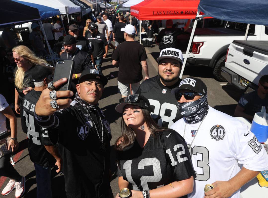 Manuel Dominguez III, from left, takes a photo with Nicole Batton, Walter Alvarez and his dad W ...