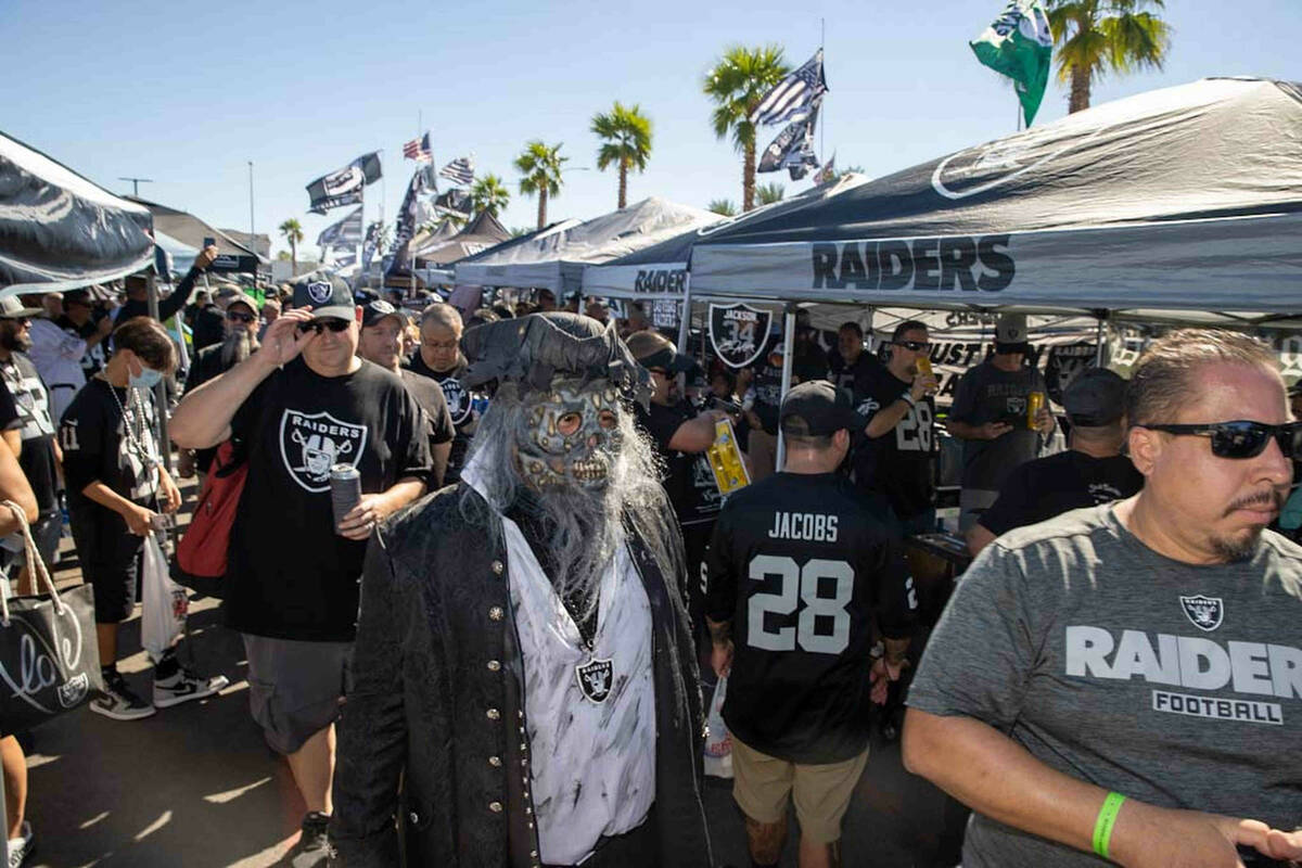 Tailgaters before an NFL football game between the Raiders and Baltimore Ravens at Allegiant St ...