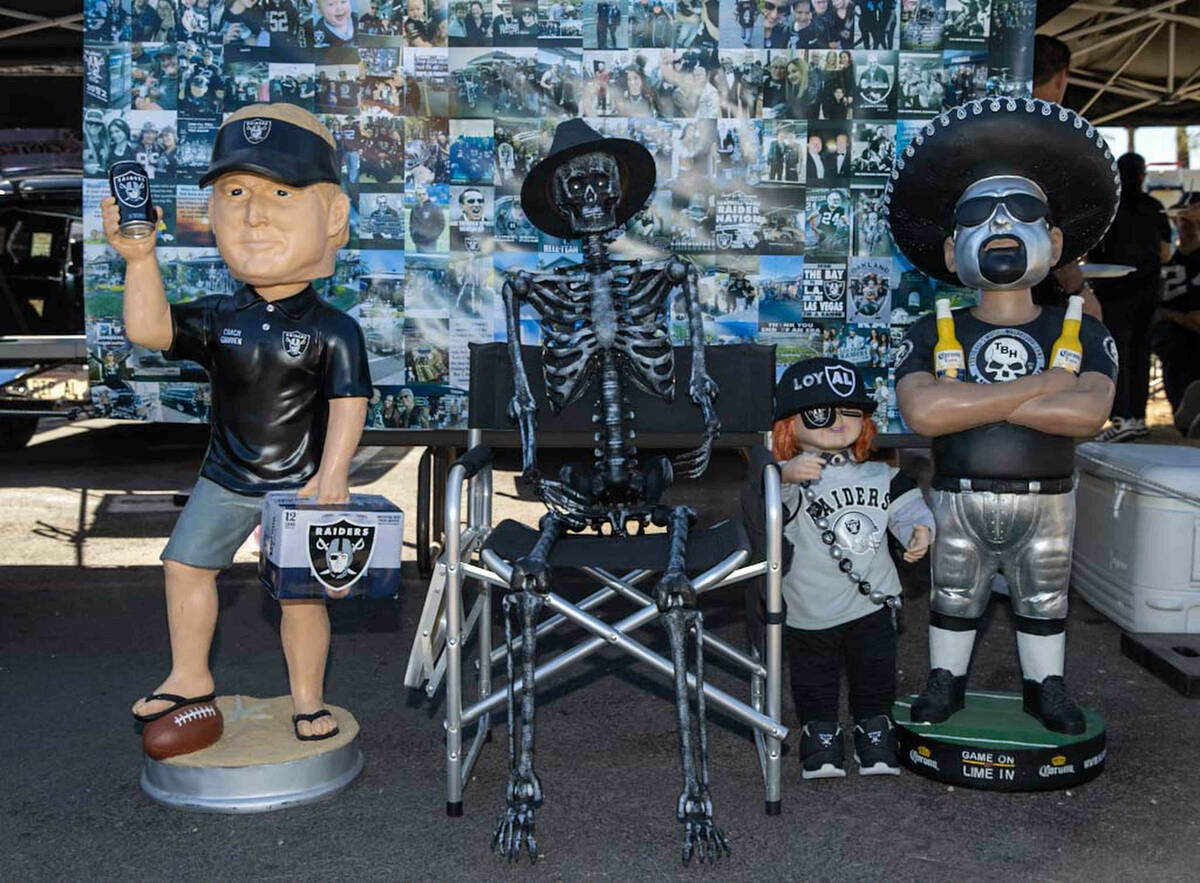 Tailgate decorations on display before an NFL football game between the Raiders and Baltimore R ...