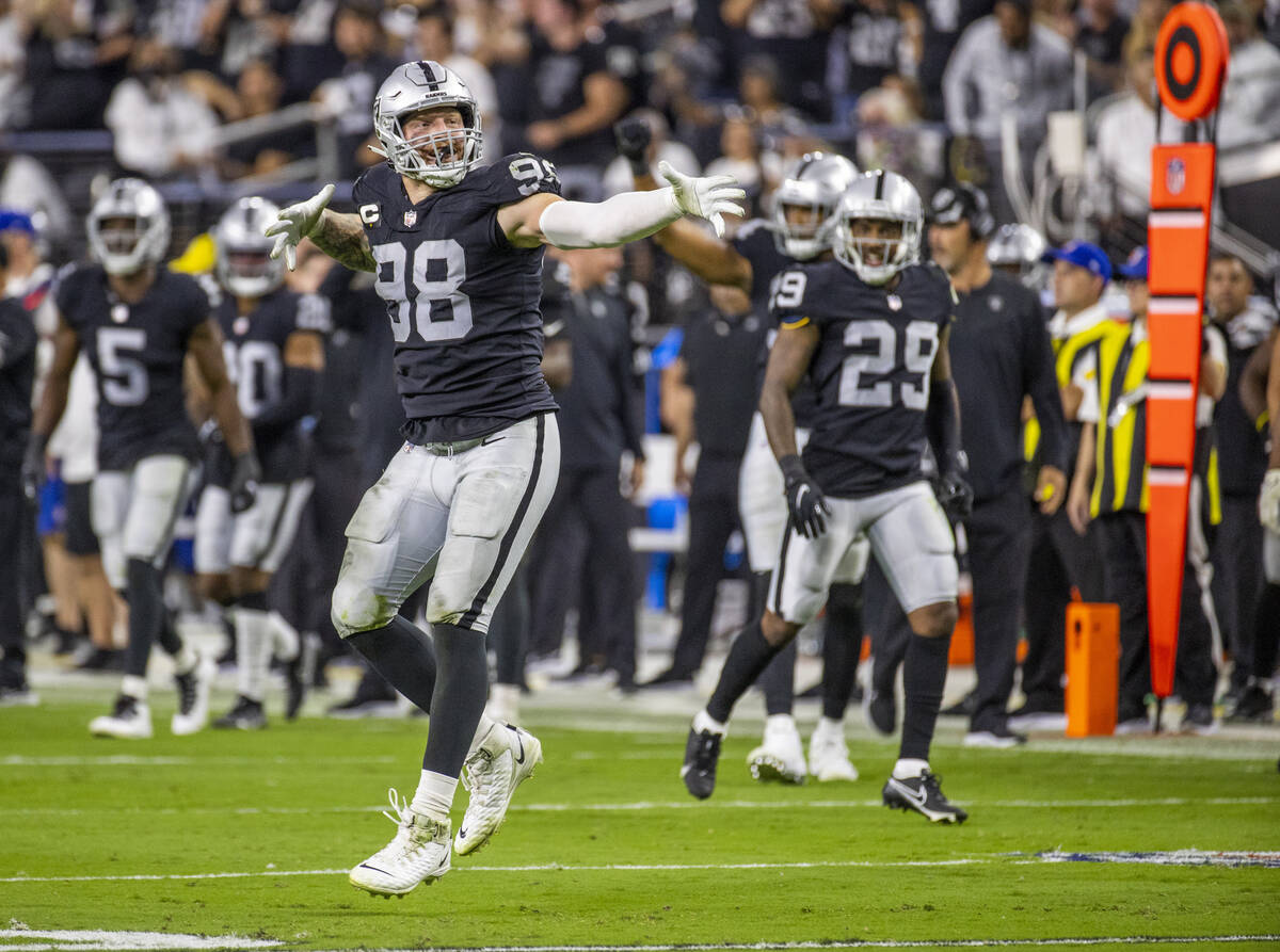 Raiders defensive end Maxx Crosby (98) celebrates a defensive stoppage during the third quarter ...