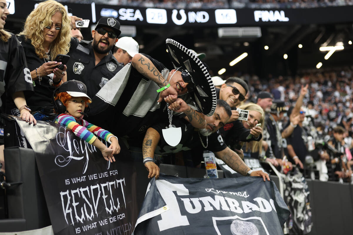 Raiders fans before an NFL football game between the Raiders and the Baltimore Ravens at Allegi ...