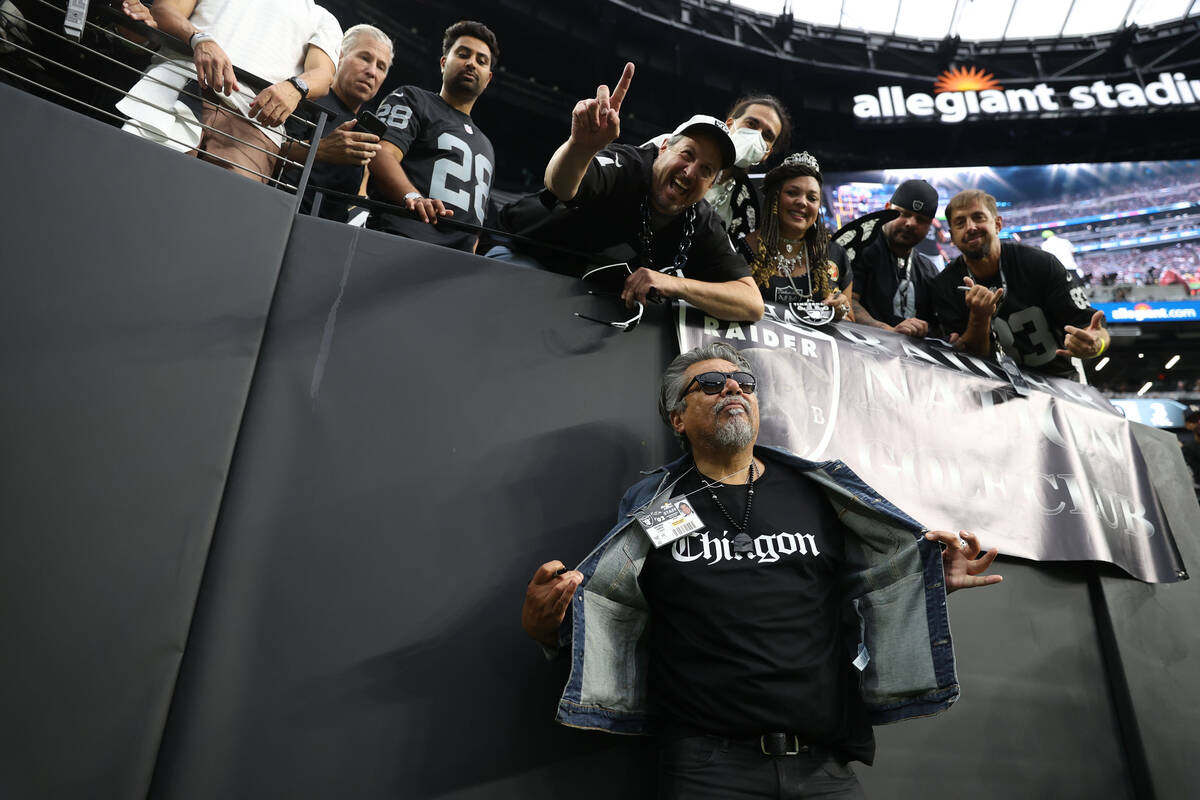 Comedian George Lopez meets with fans before an NFL football game between the Raiders and the B ...