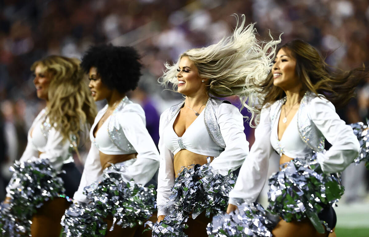 Raiders cheerleaders perform during the second quarter of an NFL football game at Allegiant Sta ...