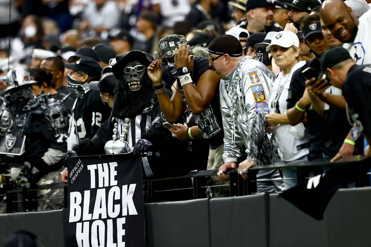 Raiders fans cheers during the first quarter of an NFL football game against the Baltimore Rave ...