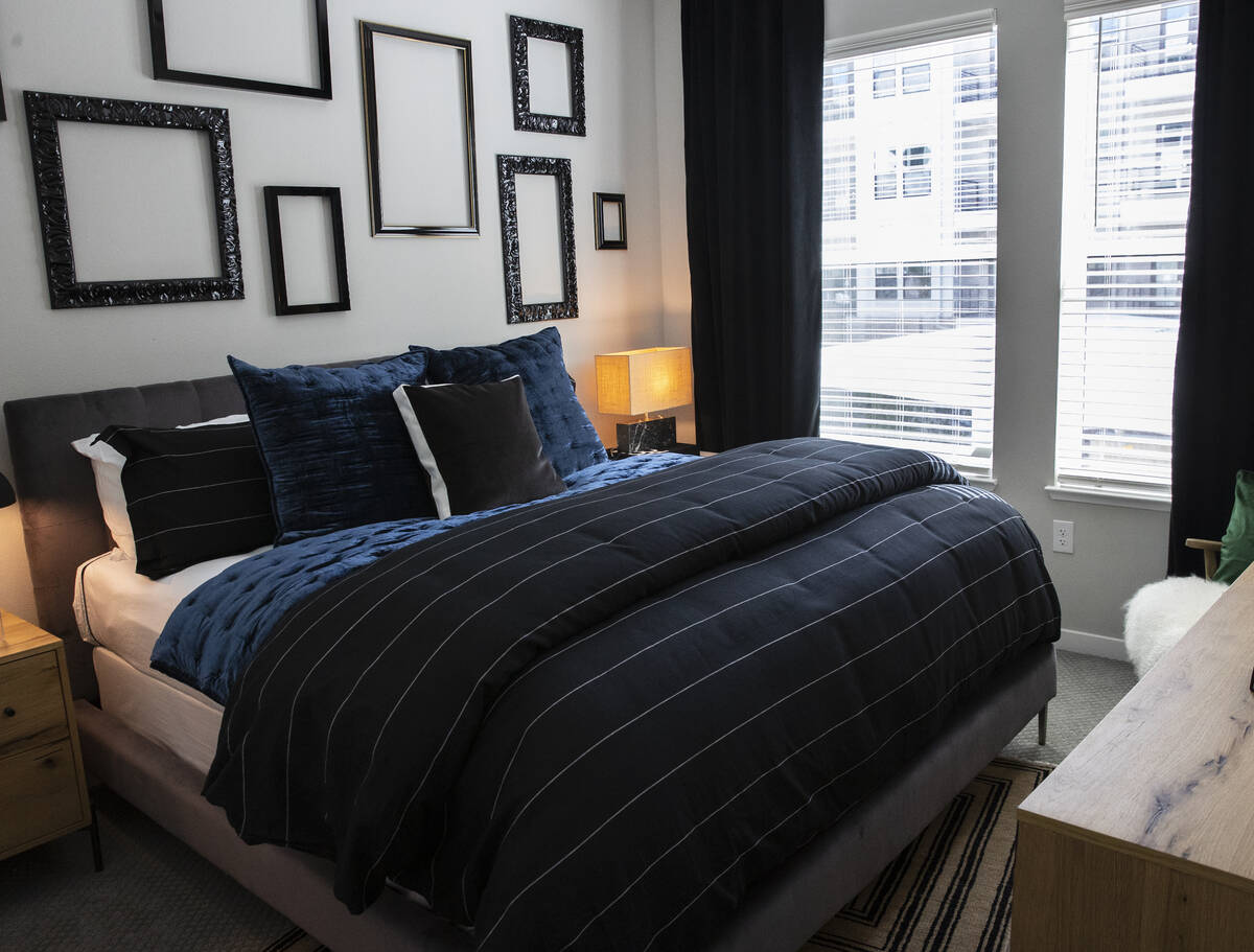 A bedroom is shown in a one-bedroom apartment at Auric Symphony Park, the first luxury multifam ...