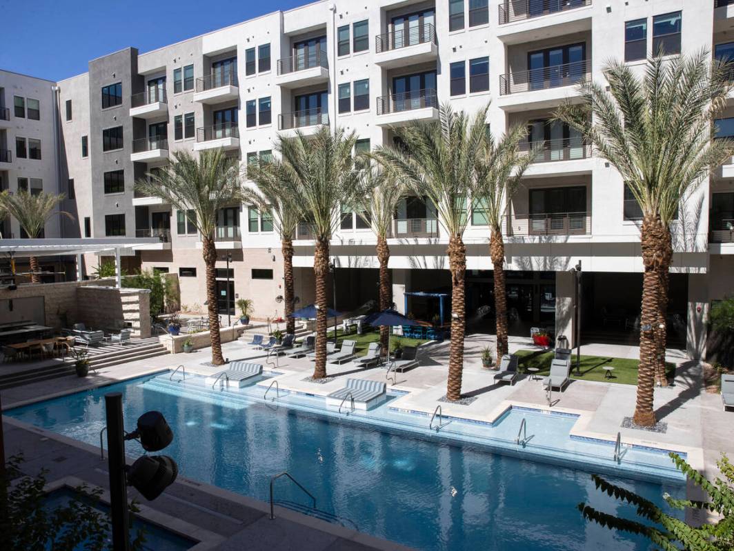 Swimming pool area as seen from the second floor apartment balcony at Auric Symphony Park, the ...