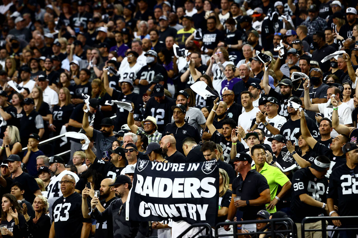 Raiders fans cheers during the first quarter of an NFL football game against the Baltimore Rave ...