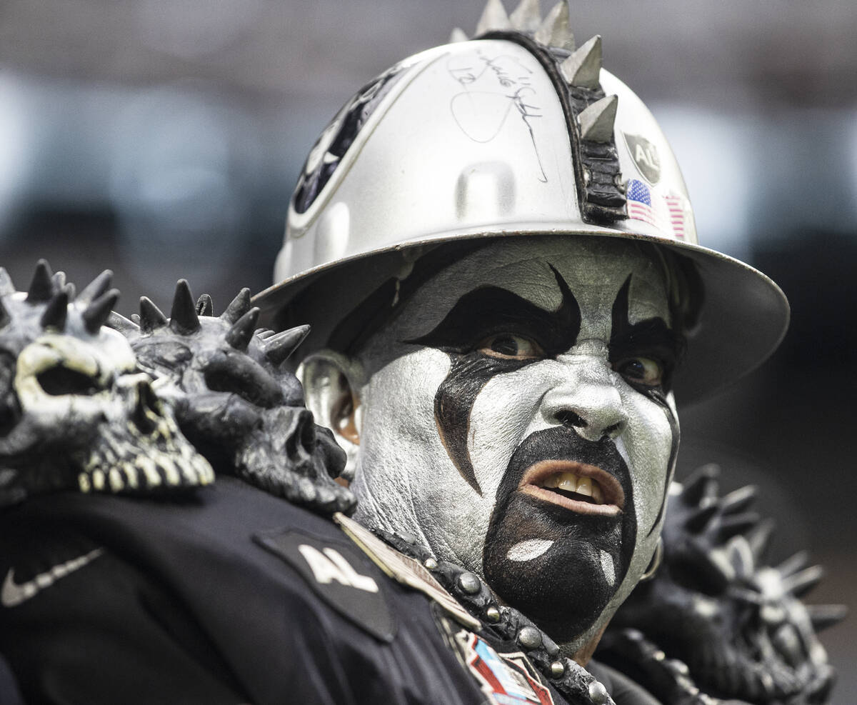 Raiders fans cheer for Las Vegas during an NFL football game against the Baltimore Ravens at Al ...