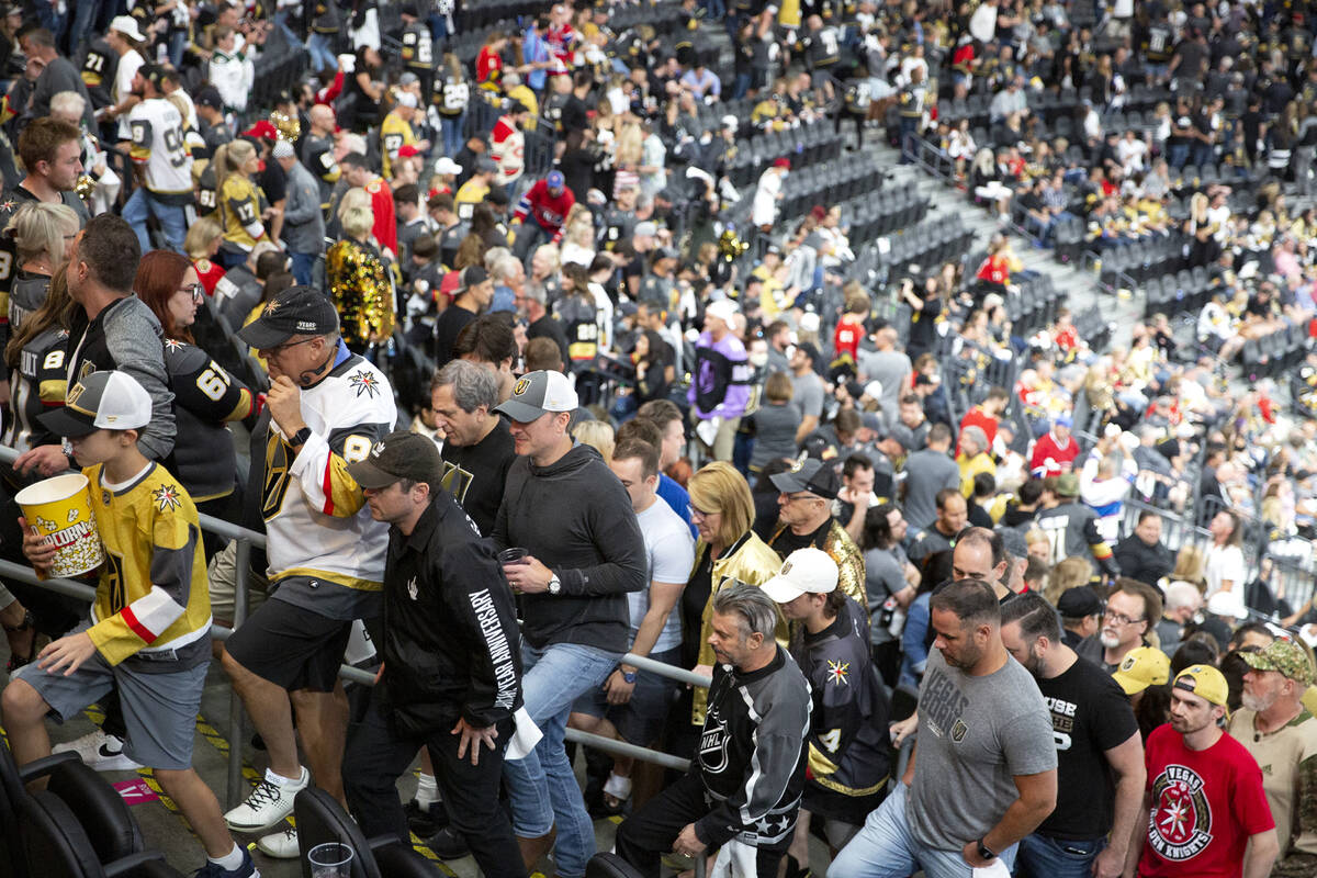 Fans leave the game before the third period is over in Game 5 of an NHL hockey Stanley Cup semi ...