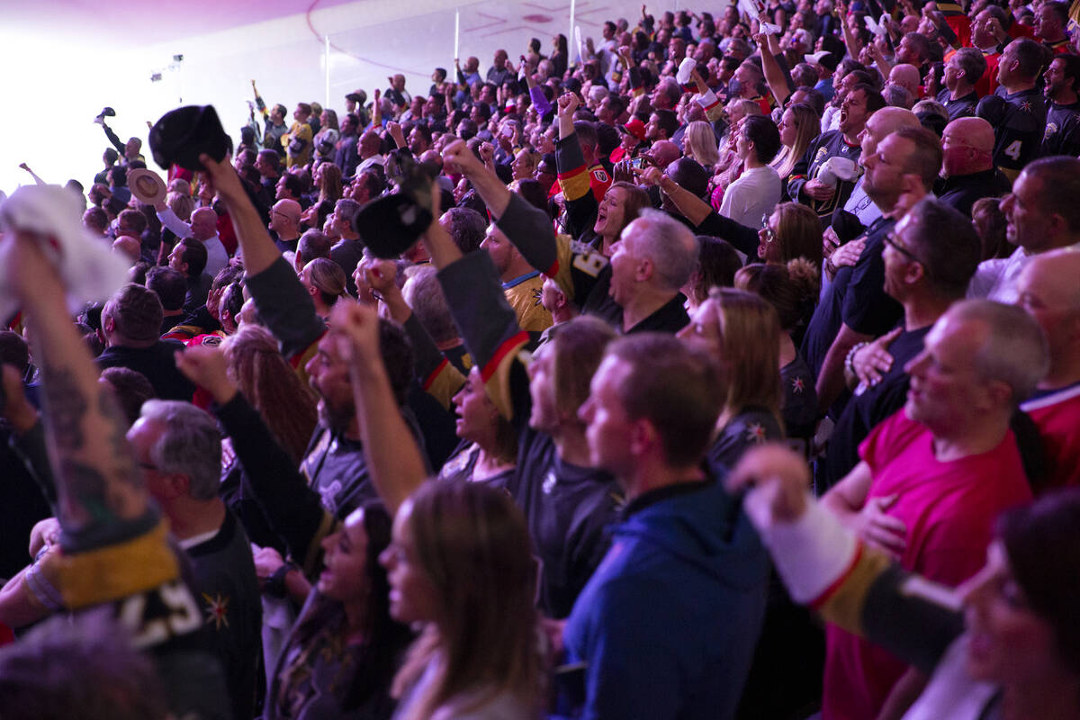 Golden Knights fans shout along with the lyrics to the National Anthem when the song gets to th ...