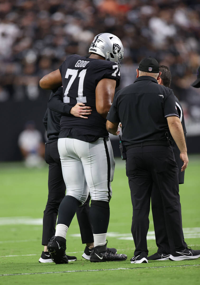 Las Vegas Raiders offensive guard Denzelle Good (71) is carried off the field during the first ...
