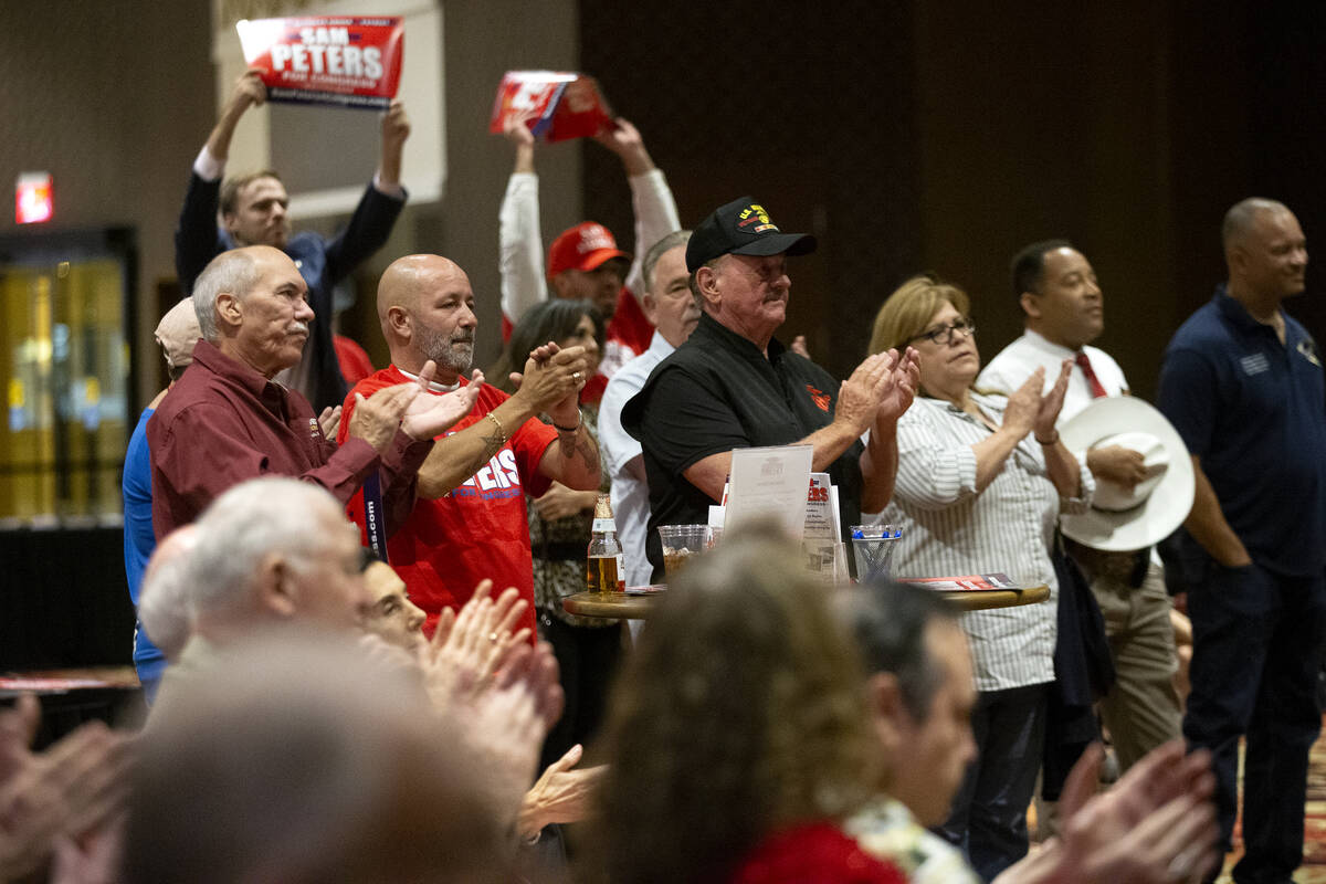 People applaud during the "Fight for Freedom" Campaign Kickoff event listen to Republican Sam P ...