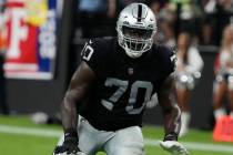 Las Vegas Raiders offensive tackle Alex Leatherwood (70) plays against the Baltimore Ravens dur ...