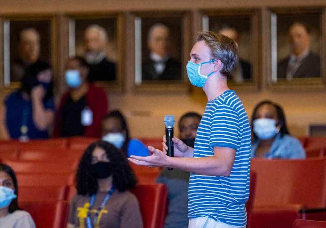 A participant answers a question during a youth mental health conversation as part of the city' ...