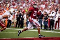 Alabama running back Jase McClellan (21) runs into the end zone for a touchdown during the firs ...