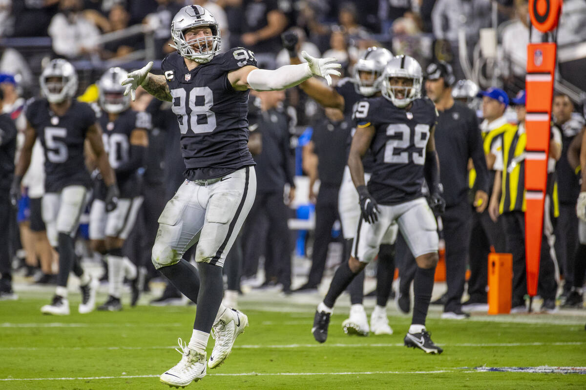 Raiders defensive end Maxx Crosby (98) celebrates a defensive stoppage during the third quarter ...