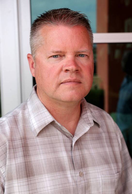 Wayne Dice, Southern Nevada liaison for the Nevada Police Union, talks to a reporter at a Hende ...