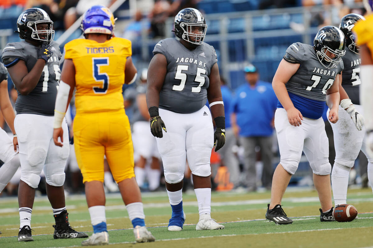 Desert Pines' BJ Brooks (55) lines up on offense in the second quarter of a football game again ...