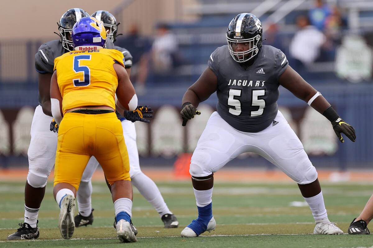 Desert Pines' BJ Brooks (55) protects the quarterback in the second quarter of a football game ...