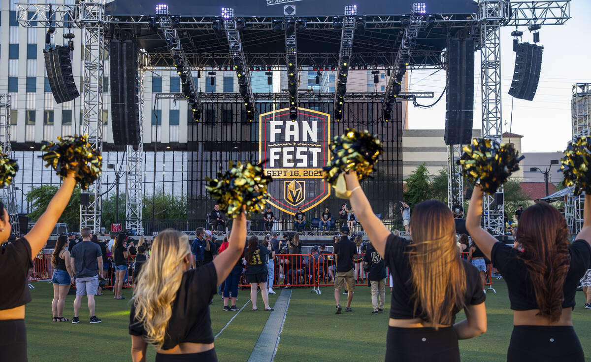 Las Vegas Vivas cheer for players on the stage during the Golden Knights annual Fan Fest at the ...