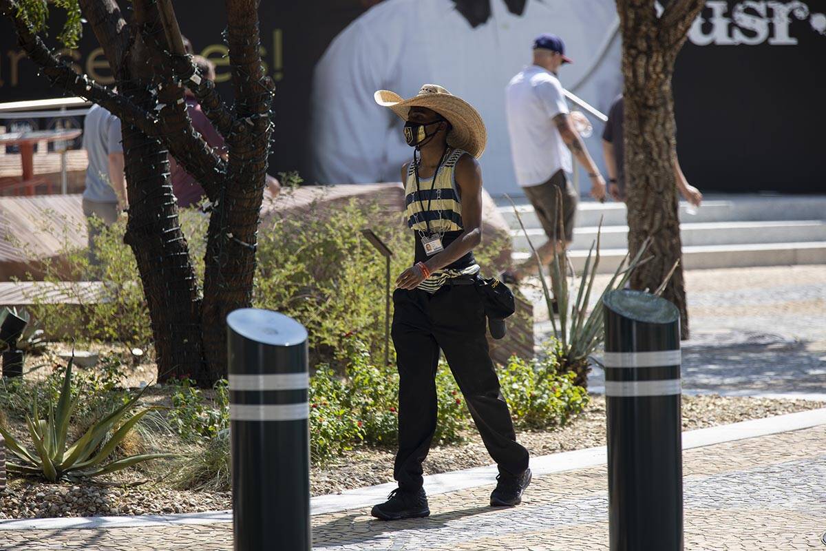 A person walks on The Park near walks the Strip near New York-New York hotel-casino in Las Vega ...