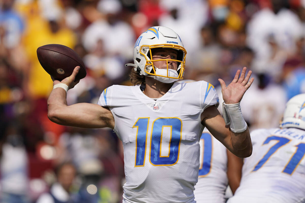 Los Angeles Chargers quarterback Justin Herbert (10) throws the ball during the second half of ...