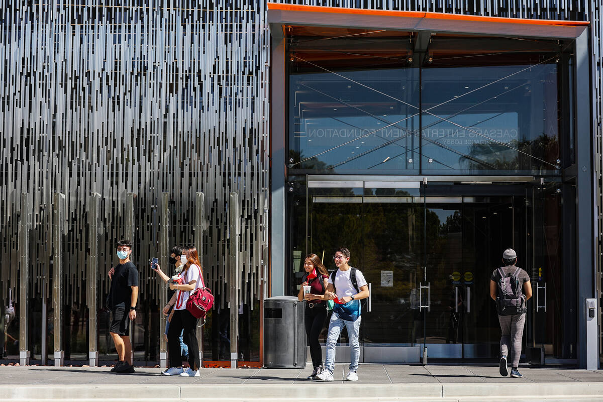 Students exit the Hospitality Hall at UNLV in Las Vegas Thursday, Sept. 16, 2021. (Rachel Aston ...
