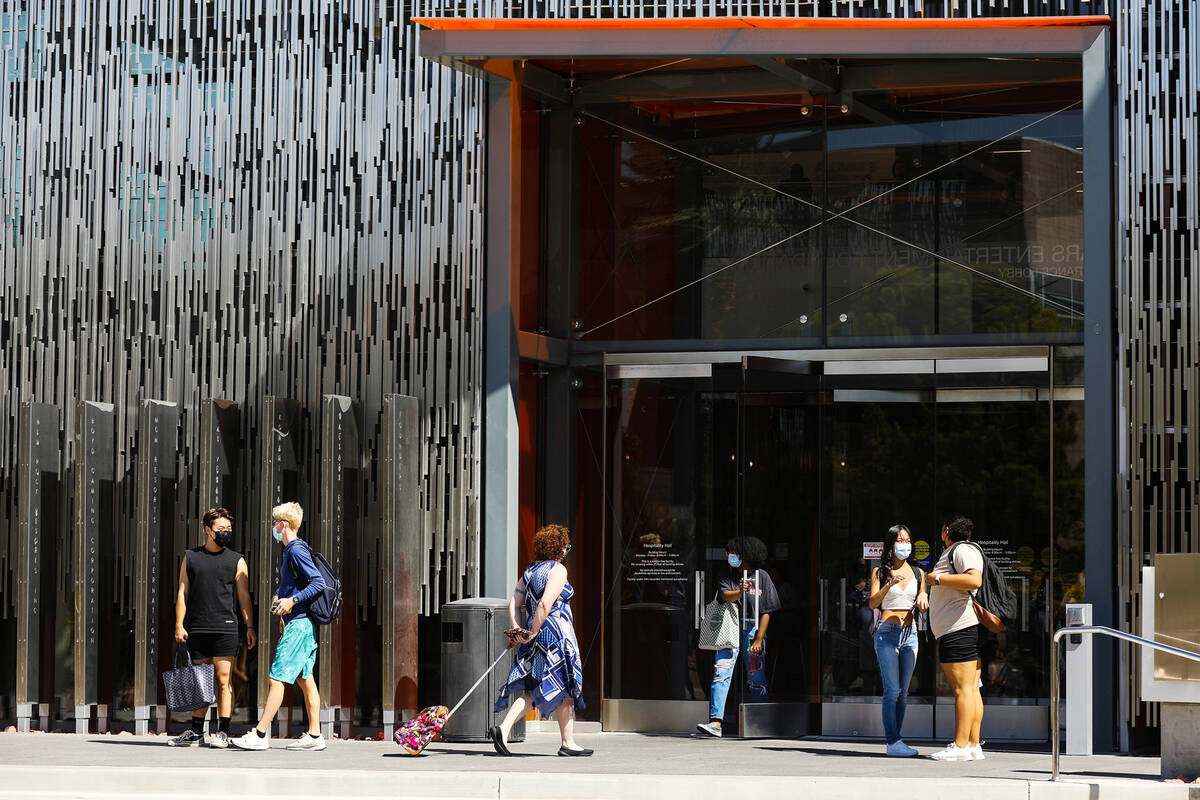Students exit the Hospitality Hall at UNLV in Las Vegas Thursday, Sept. 16, 2021. (Rachel Aston ...