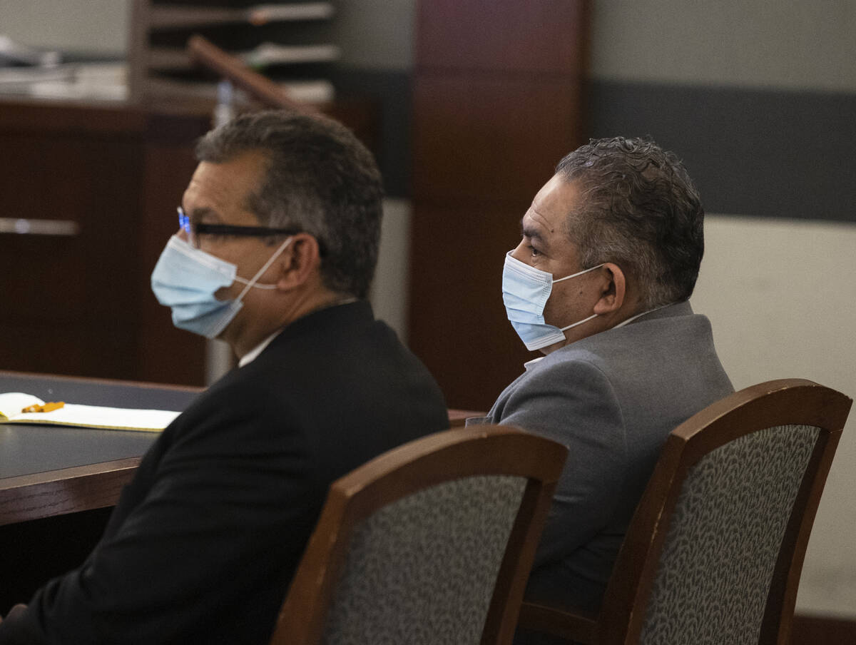 Omar Rueda-Denvers, right, and his attorney Christopher Oram listen as Eckley Keach, a prosecut ...