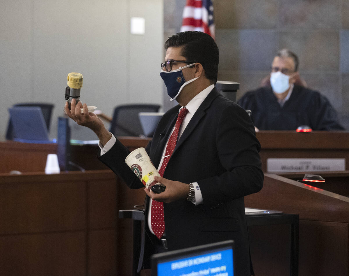 Eckley Keach, a prosecutor, holds a type of pipe bomb as he delivers a closing arguments as Jud ...