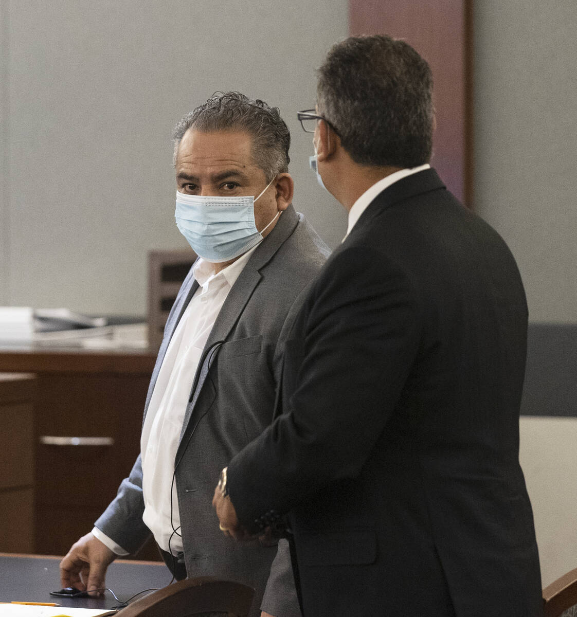 Omar Rueda-Denvers, left, and his attorney Christopher Oram appear in court during Denvers&#x20 ...