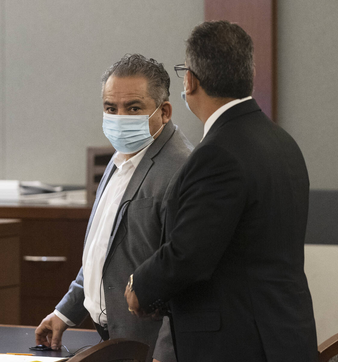 Omar Rueda-Denvers, left, and his attorney Christopher Oram appear in court during Denvers  ...