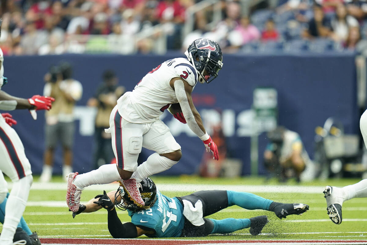 Houston Texans running back Mark Ingram II (2) carries the ball during an NFL football game aga ...