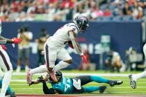 Houston Texans running back Mark Ingram II (2) carries the ball during an NFL football game aga ...
