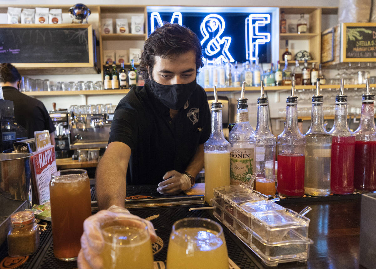 Barkeep Joseph Daniels serves drinks at Makers & Finders on Wednesday, Sept. 15, 2021, in L ...