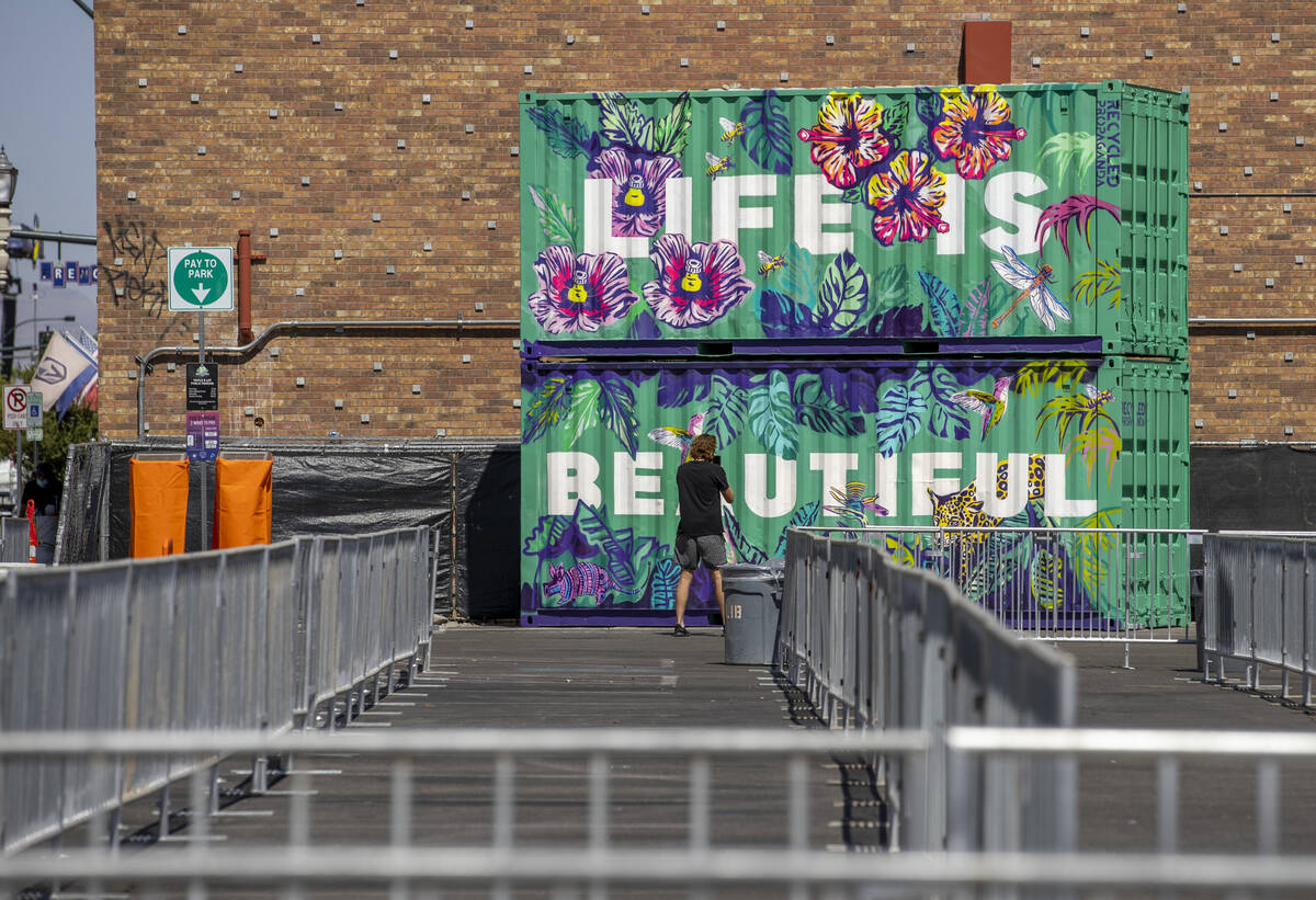 Art containers are in place about an entrance to Life is Beautiful off of South 6th Street on T ...