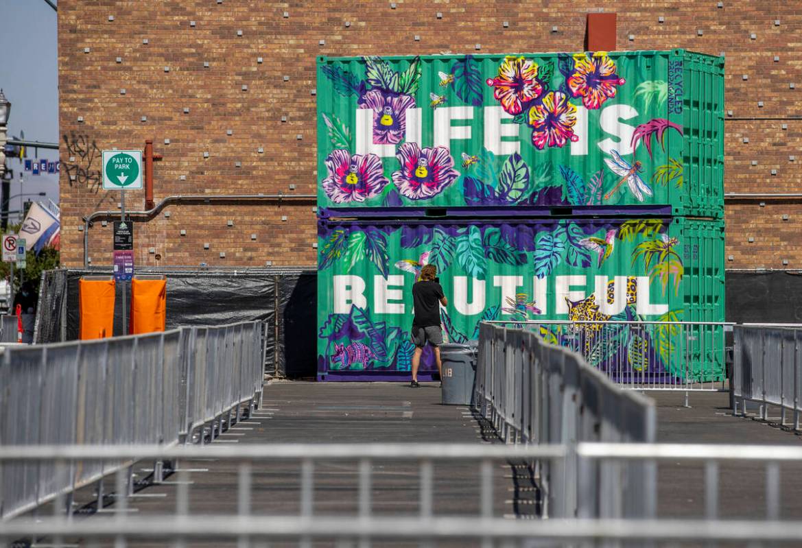 Art containers are in place about an entrance to Life is Beautiful off of South 6th Street on T ...