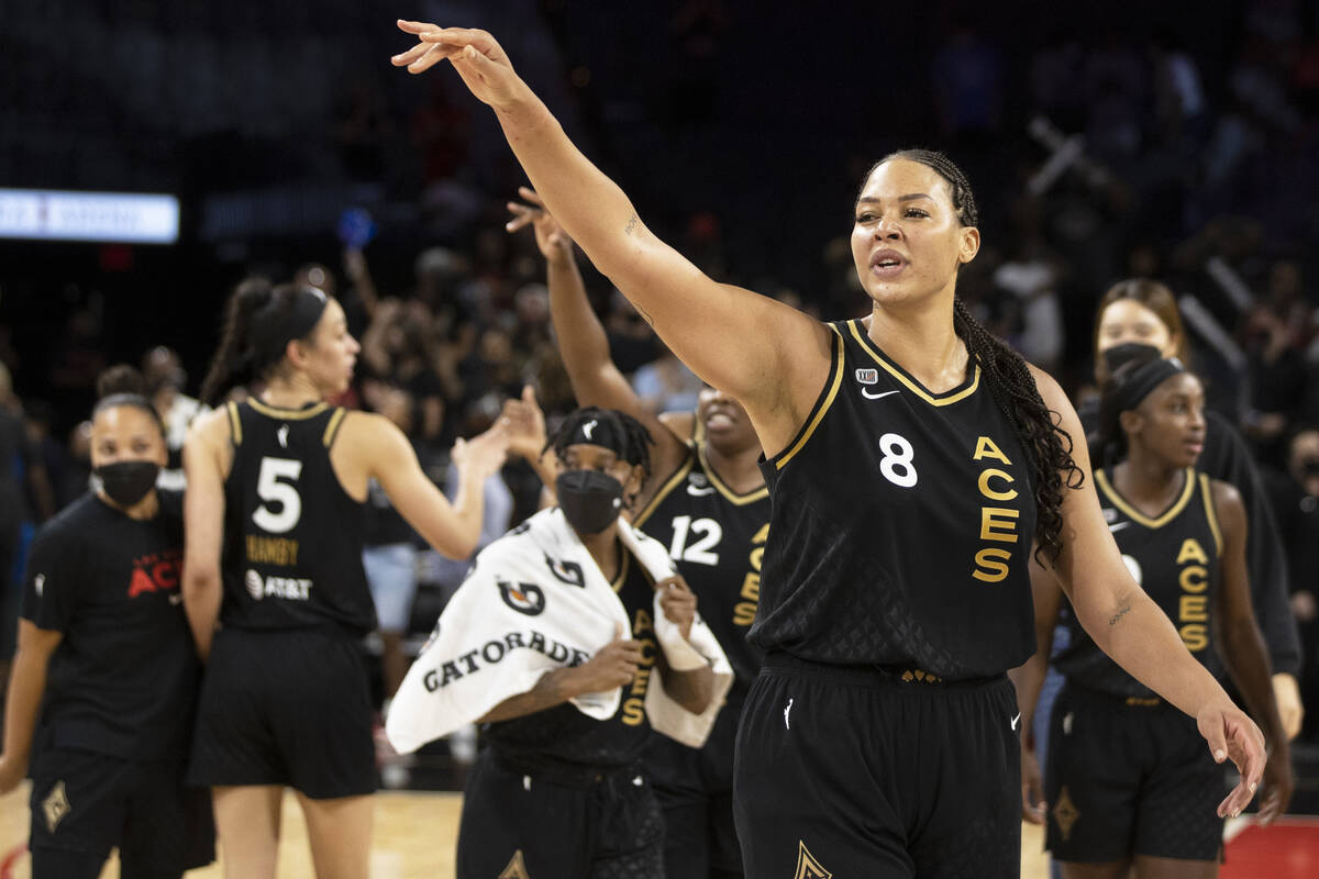 Las Vegas Aces center Liz Cambage (8) waves goodbye to Washington Mystic players after the Ace ...