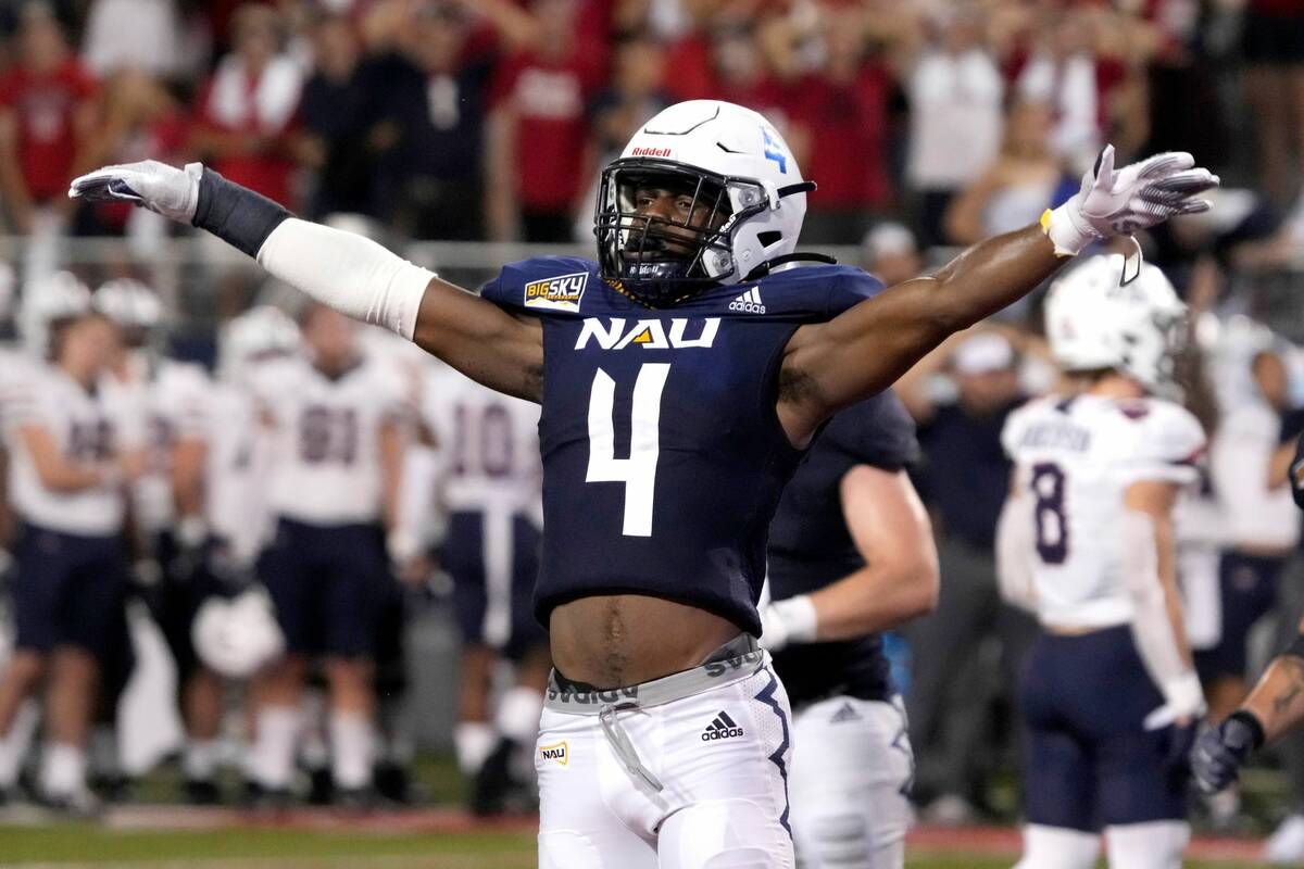 Northern Arizona defensive back Brenndan Johnson (4) reacts after stopping Arizona on a two poi ...