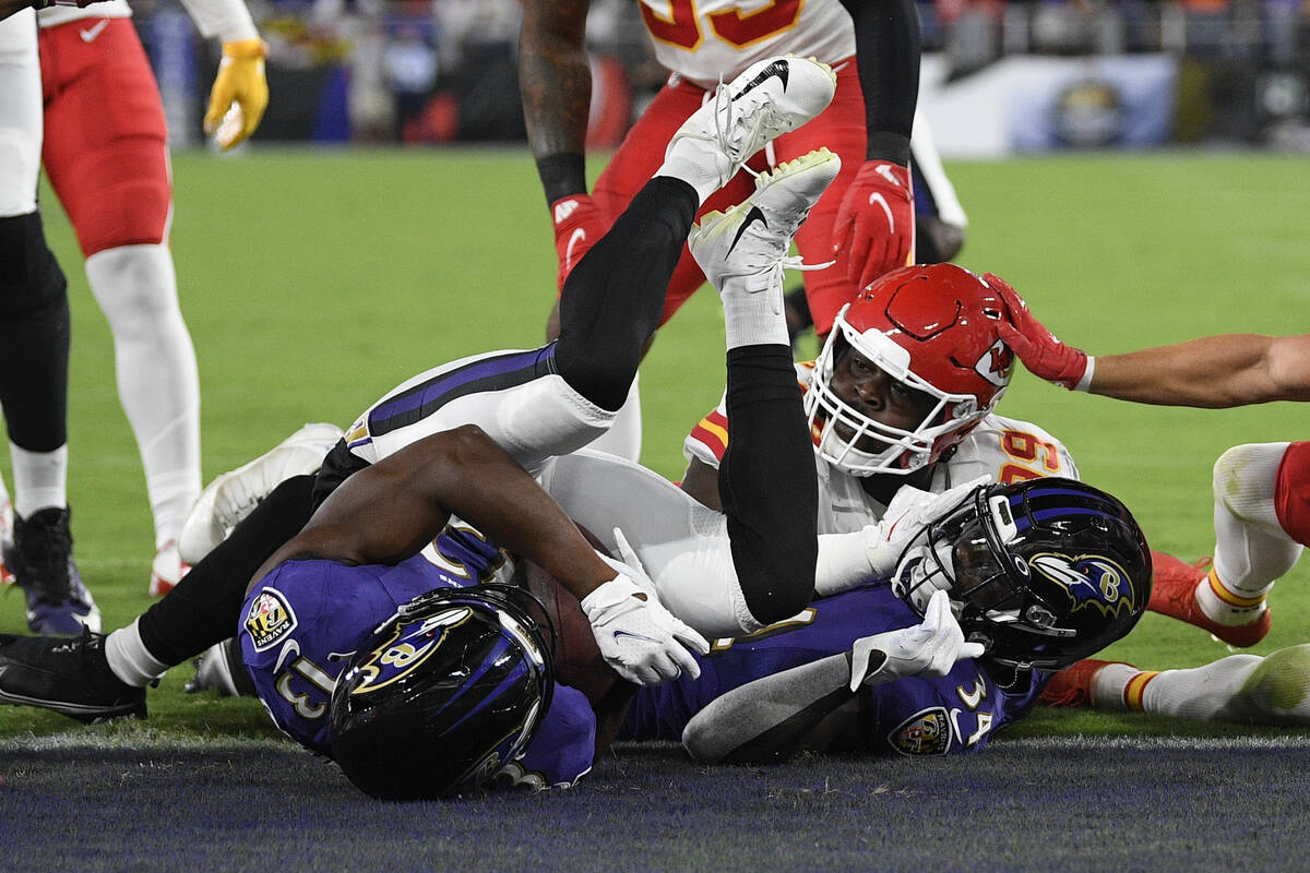 Baltimore Ravens wide receiver Devin Duvernay scores a touchdown in the first half of an NFL fo ...