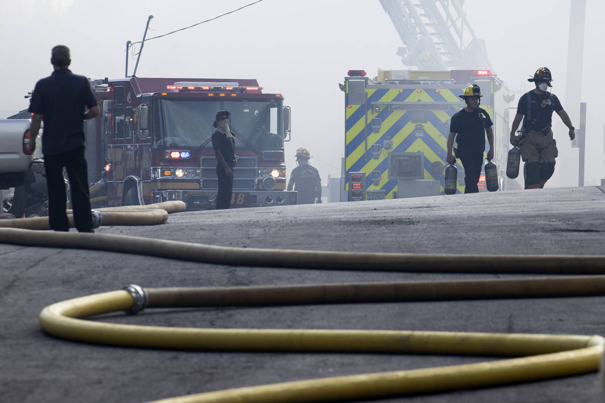Firefighters battle a blaze at Mount Charleston Lodge on Friday, Sep. 17, 2021. (Bizuayehu Tesf ...