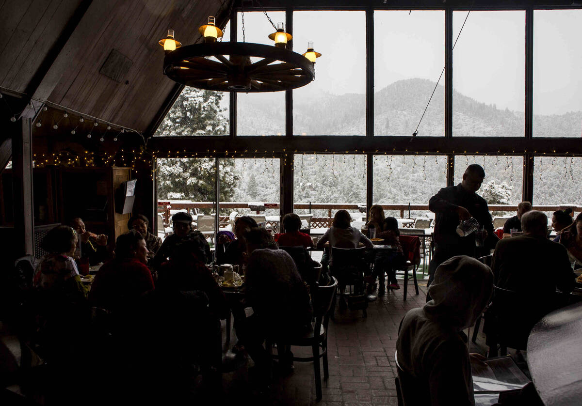 Customers eat and check out the views at Mount Charleston Lodge on Tuesday, May 1, 2018. (Revie ...