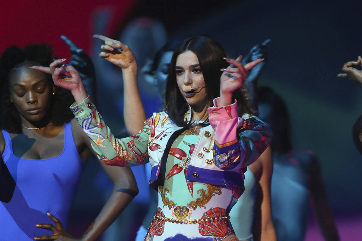 Dua Lipa performs at the Brit Awards 2018 in London, Wednesday, Feb. 21, 2018. (Photo by Joel C ...